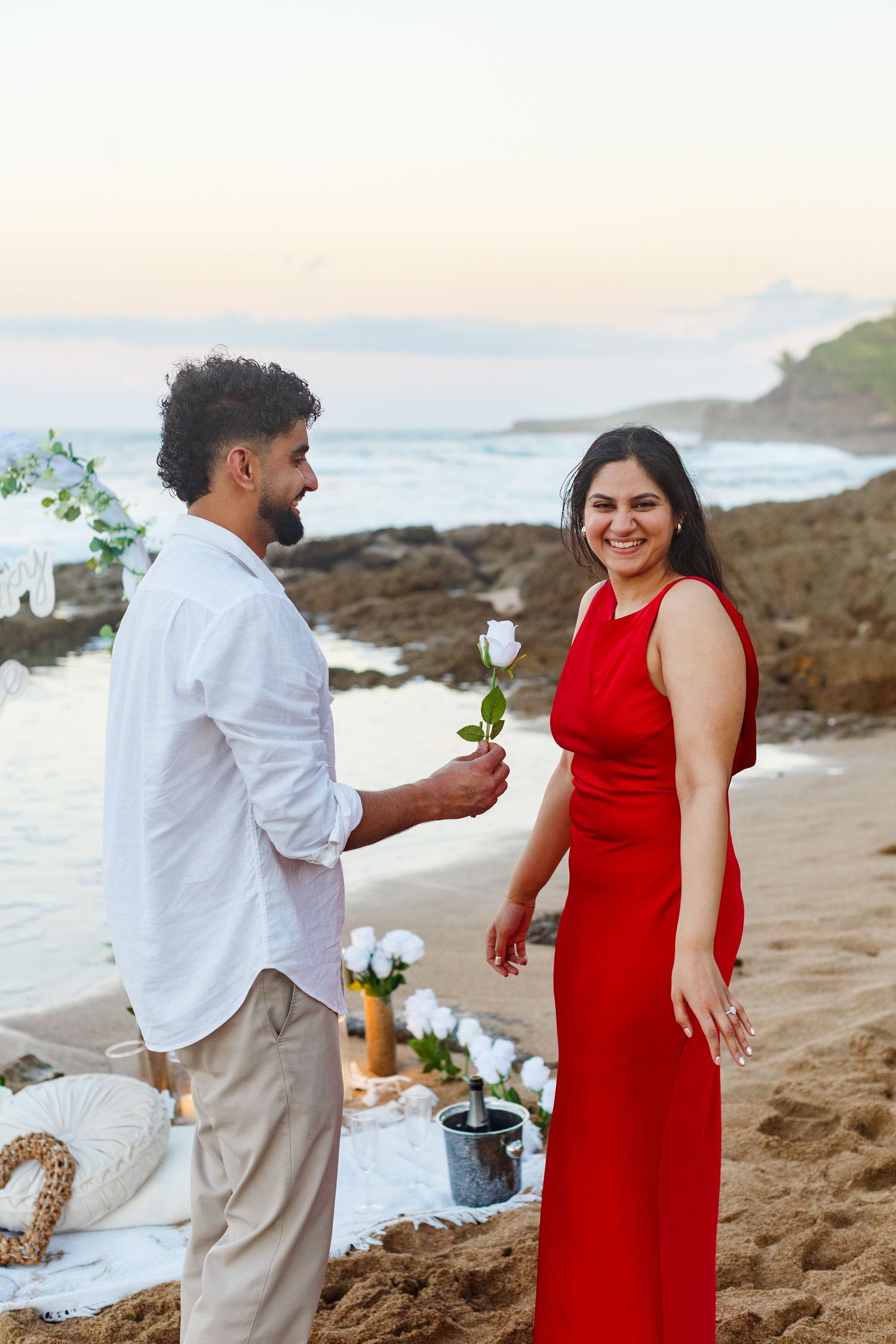 Couples portrait. Proposal and engagement session. Man and woman on the beach. Kikita Surf Beach, Dorado, Puerto Rico.