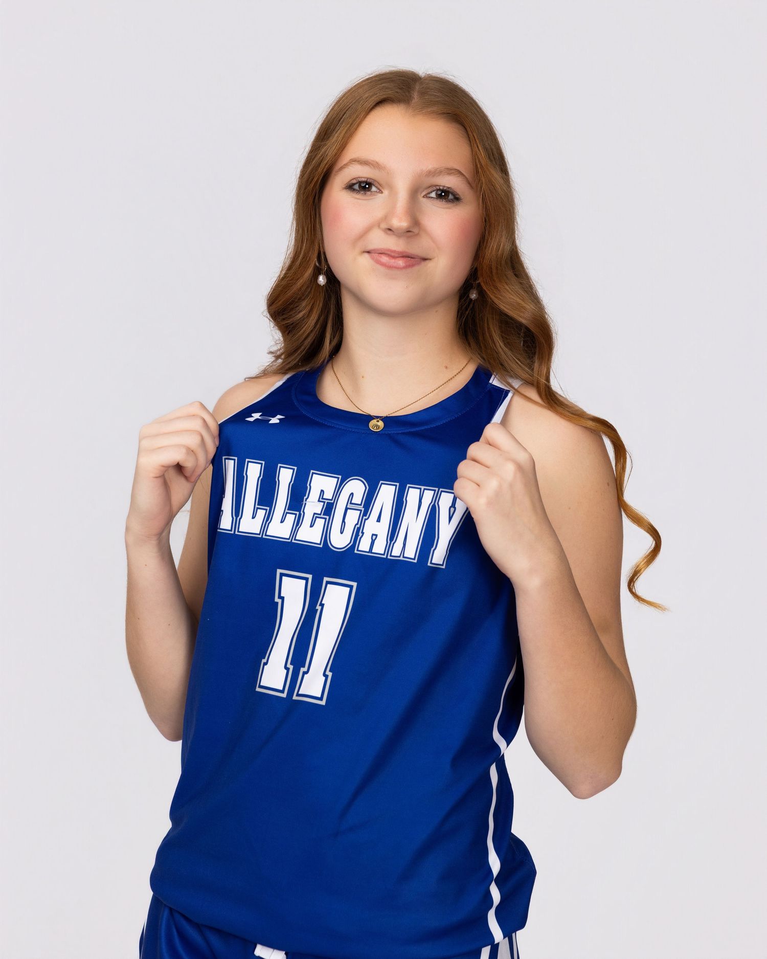 Karen Morgan Photography sports media day, Basketball player wearing a blue Allegany jersey number 11 poses for a team photo