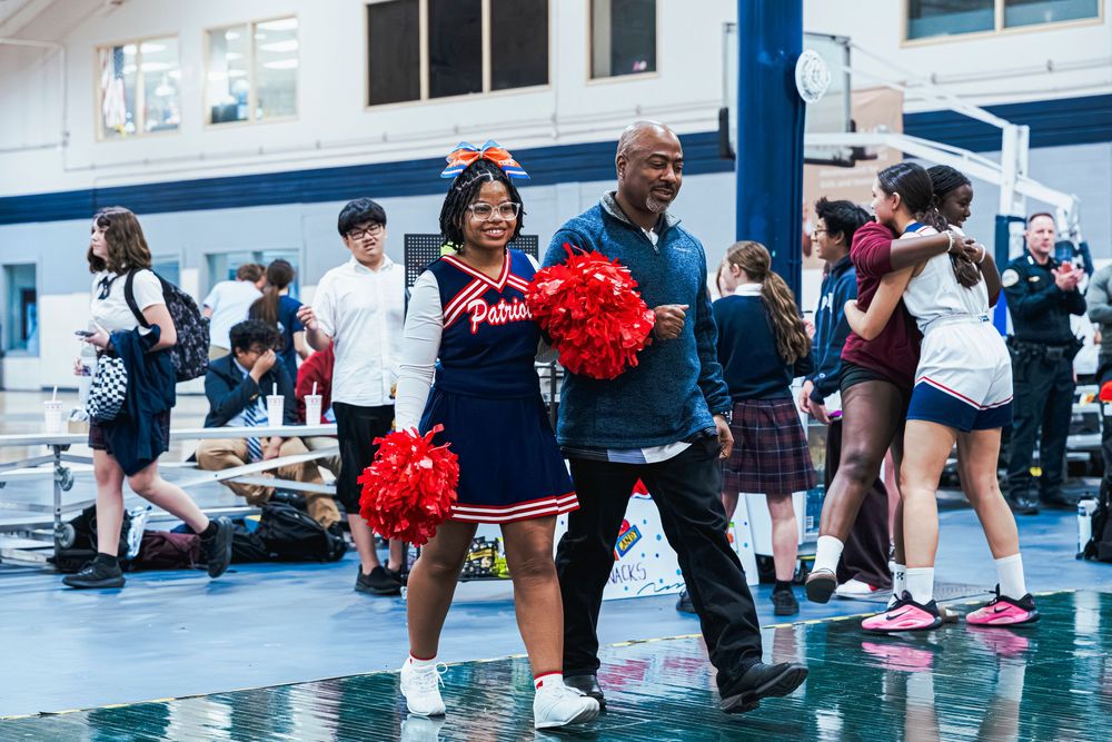 Daughter and Father walking during Senior Night