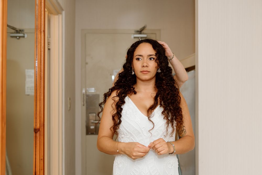 Bride getting ready in her hotel room in Muskoka