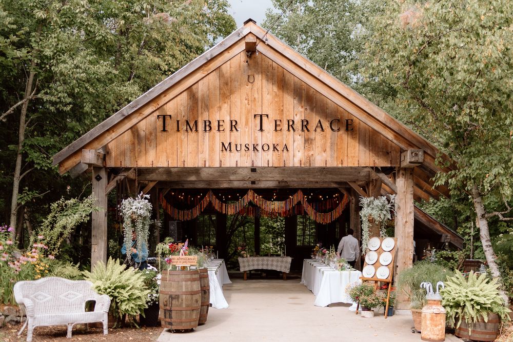 the covered pavilion space at timber terrace muskoka decorated for k+r's wedding day