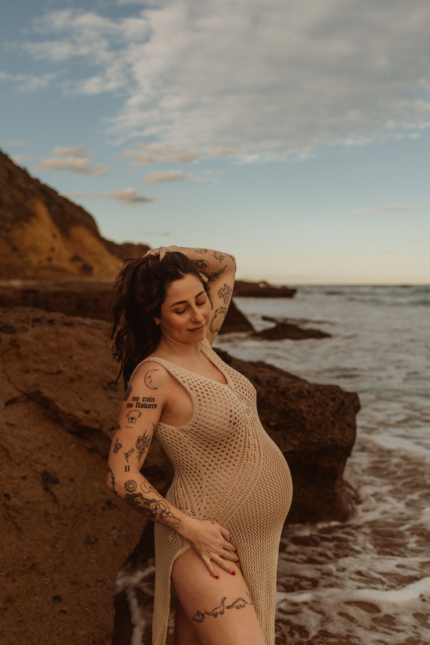 Photoshoot of Crochet dress on maternity model at a Surfcoast Beach during sunset. Geelong, Australia
