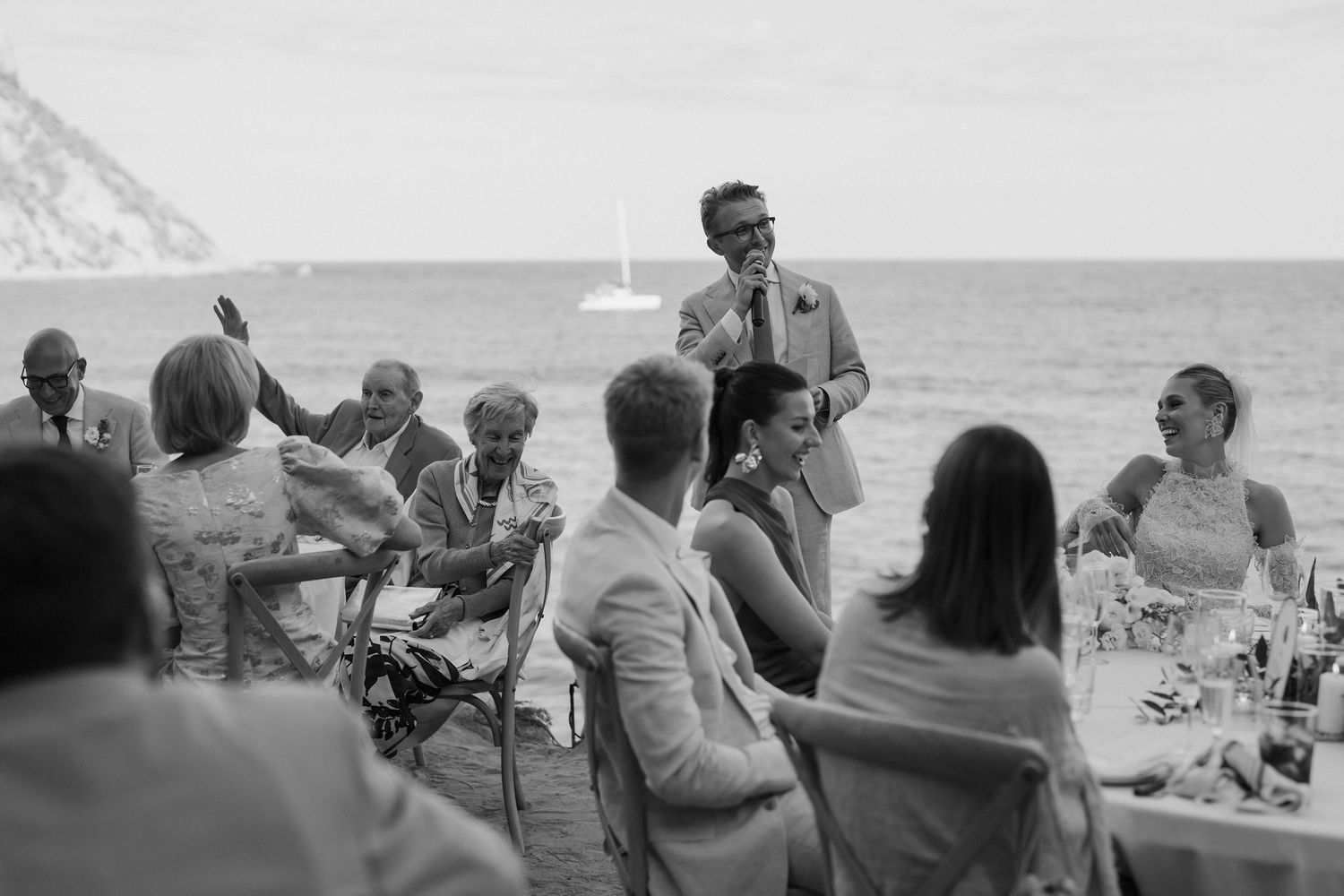 wedding guests laughing during grooms speech at amante ibiza