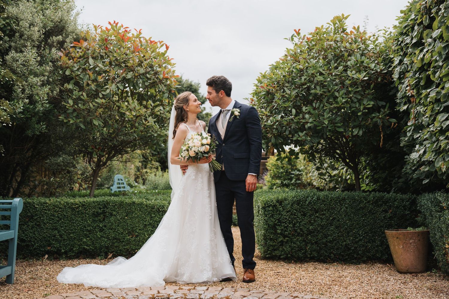 The Manor House Wedding Photography Moreton-In-The-Marsh with bride and groom in gardens