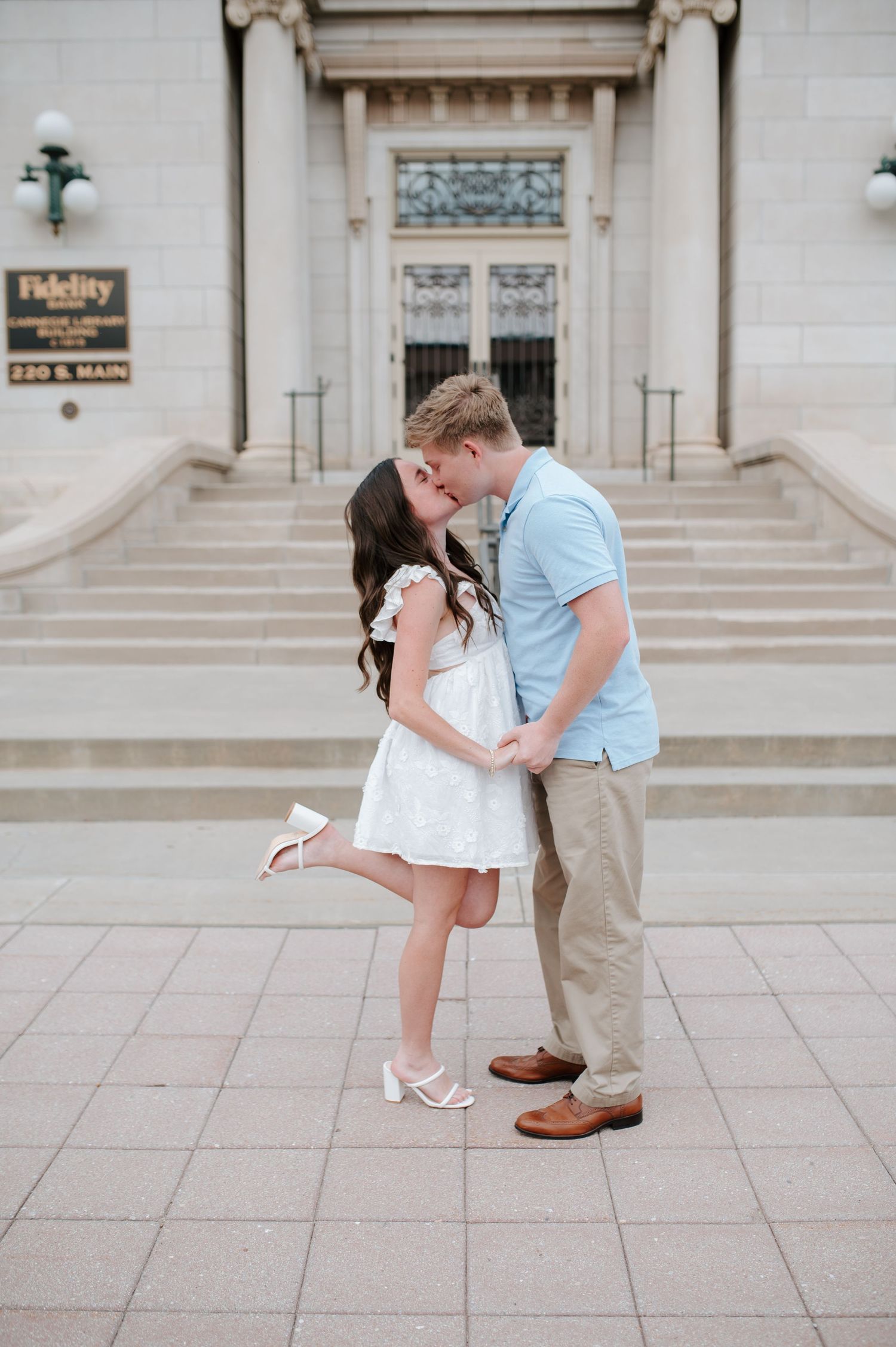 Engagement session in downtown Wichita, KS by photographer Jessica Nadine Photography. Courthouse building, old buildings, fidelity classic