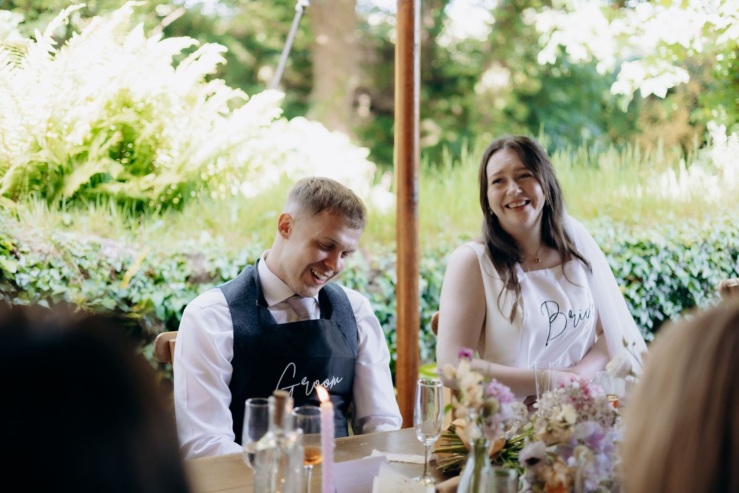 Bride and groom celebrating with loved ones.