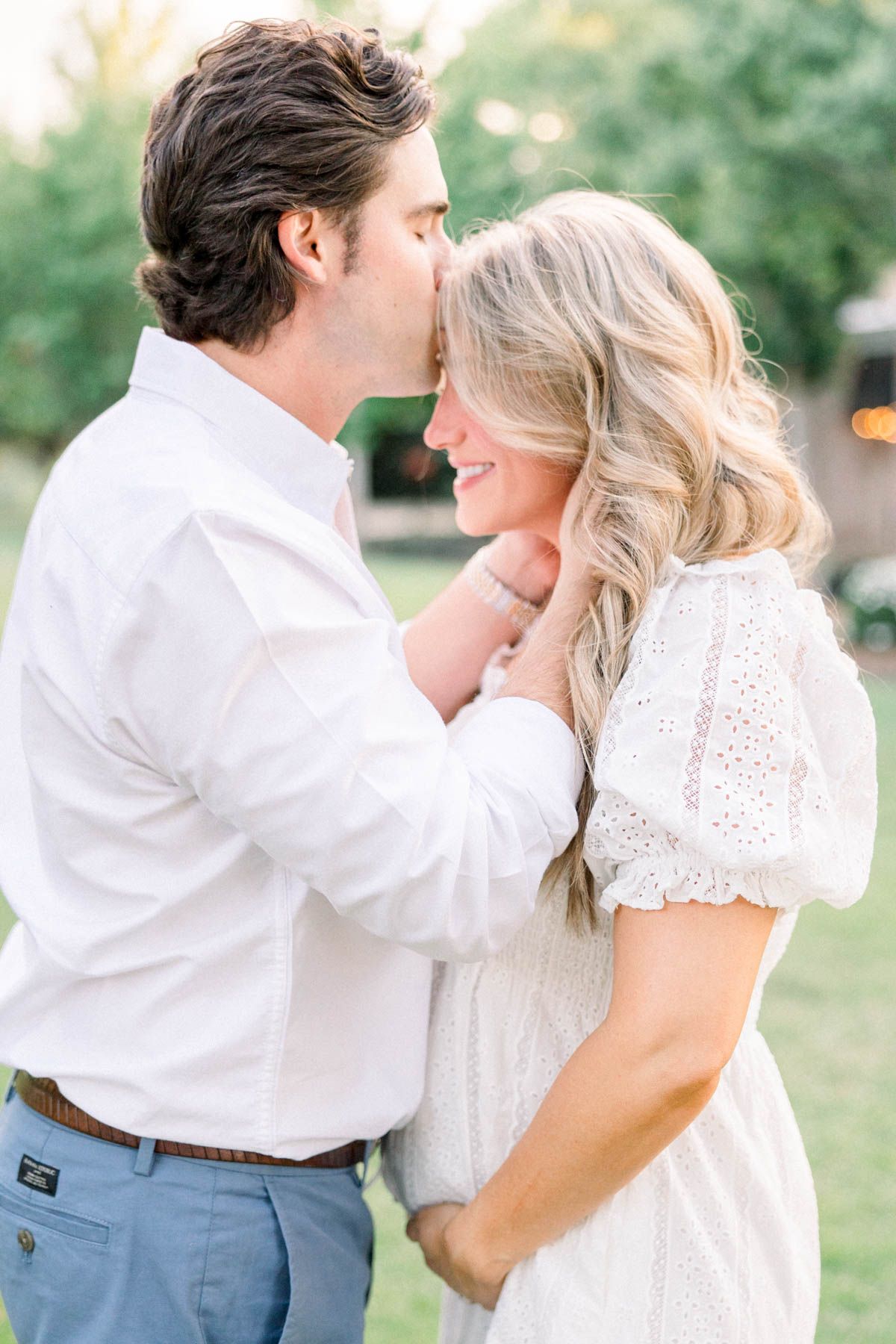Couple embracing during luxury maternity photography session in North Augusta