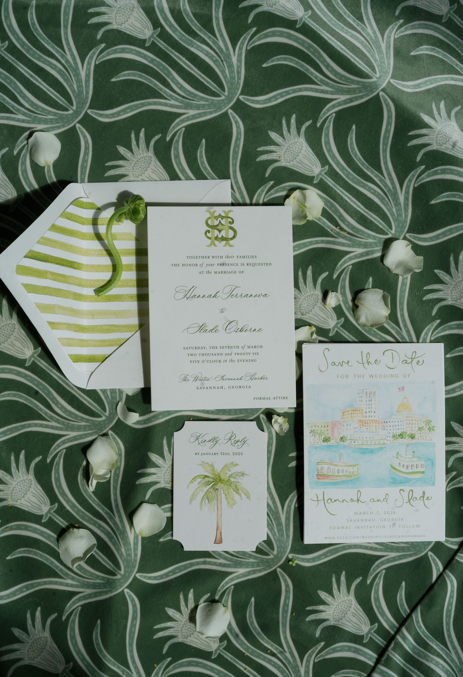 Elegant wedding invitation suite with palm tree motifs on green floral background, featuring save the date and RSVP cards.