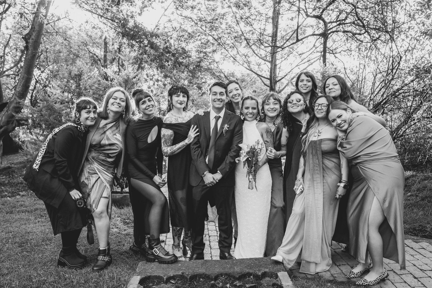 A series of group photos taken outdoors with people posing together against blurred natural backgrounds.