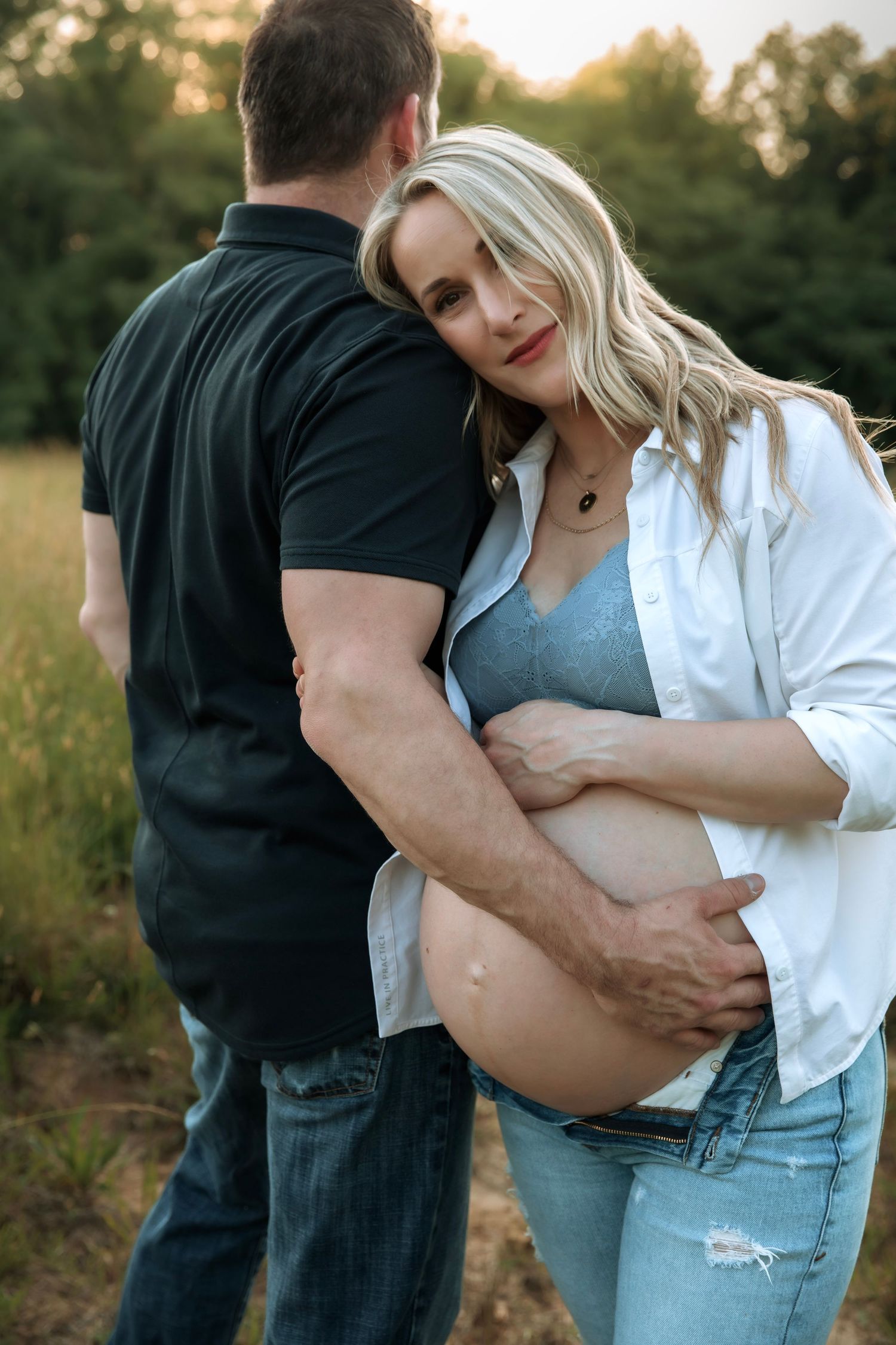 Outdoor maternity photo in golden field near Nashville Tennessee