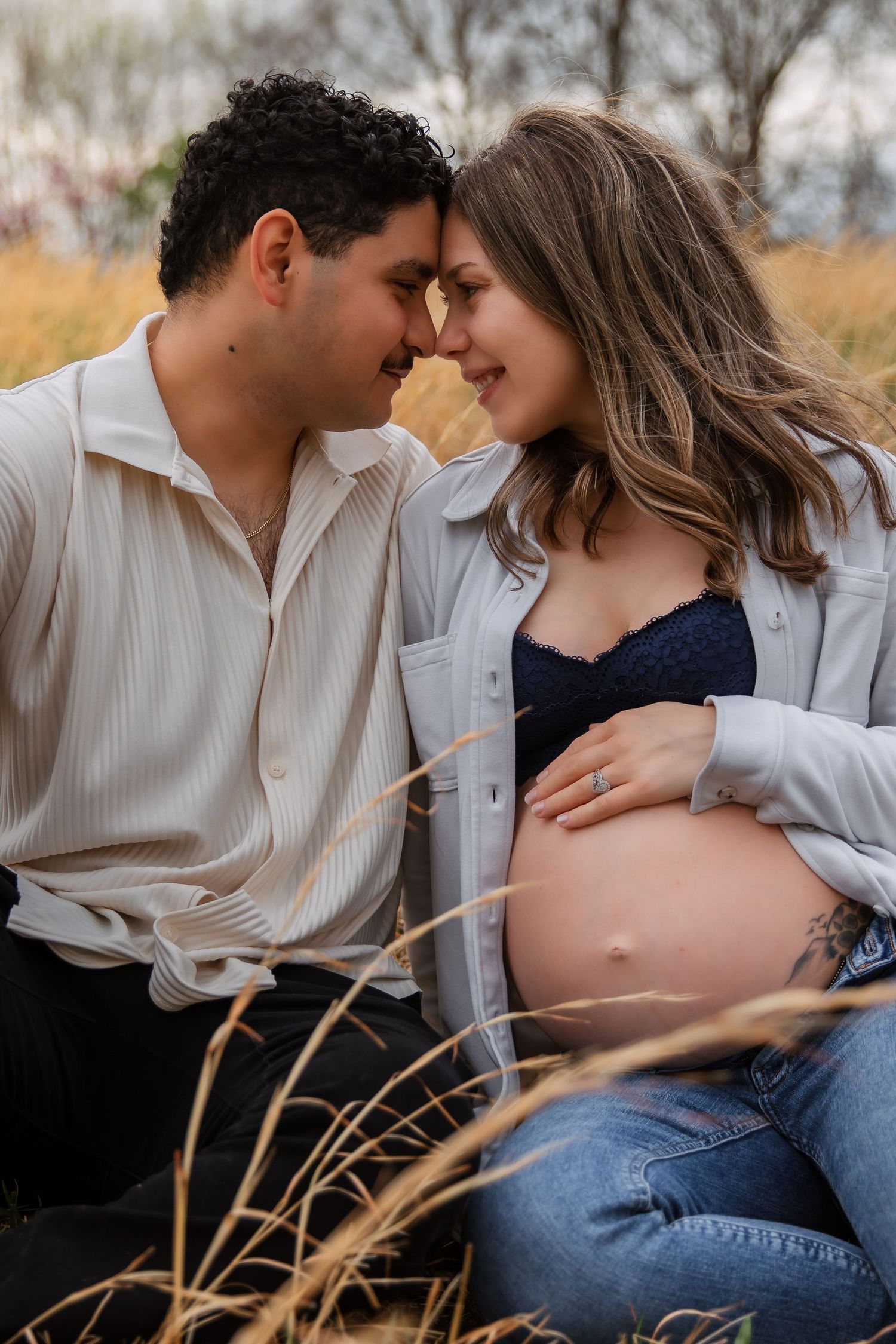 Outdoor maternity photo in golden field near Nashville Tennessee