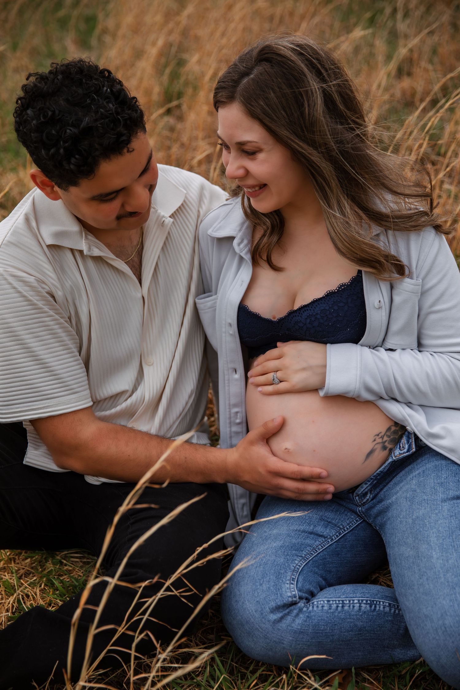 Outdoor maternity photo in golden field near Nashville Tennessee