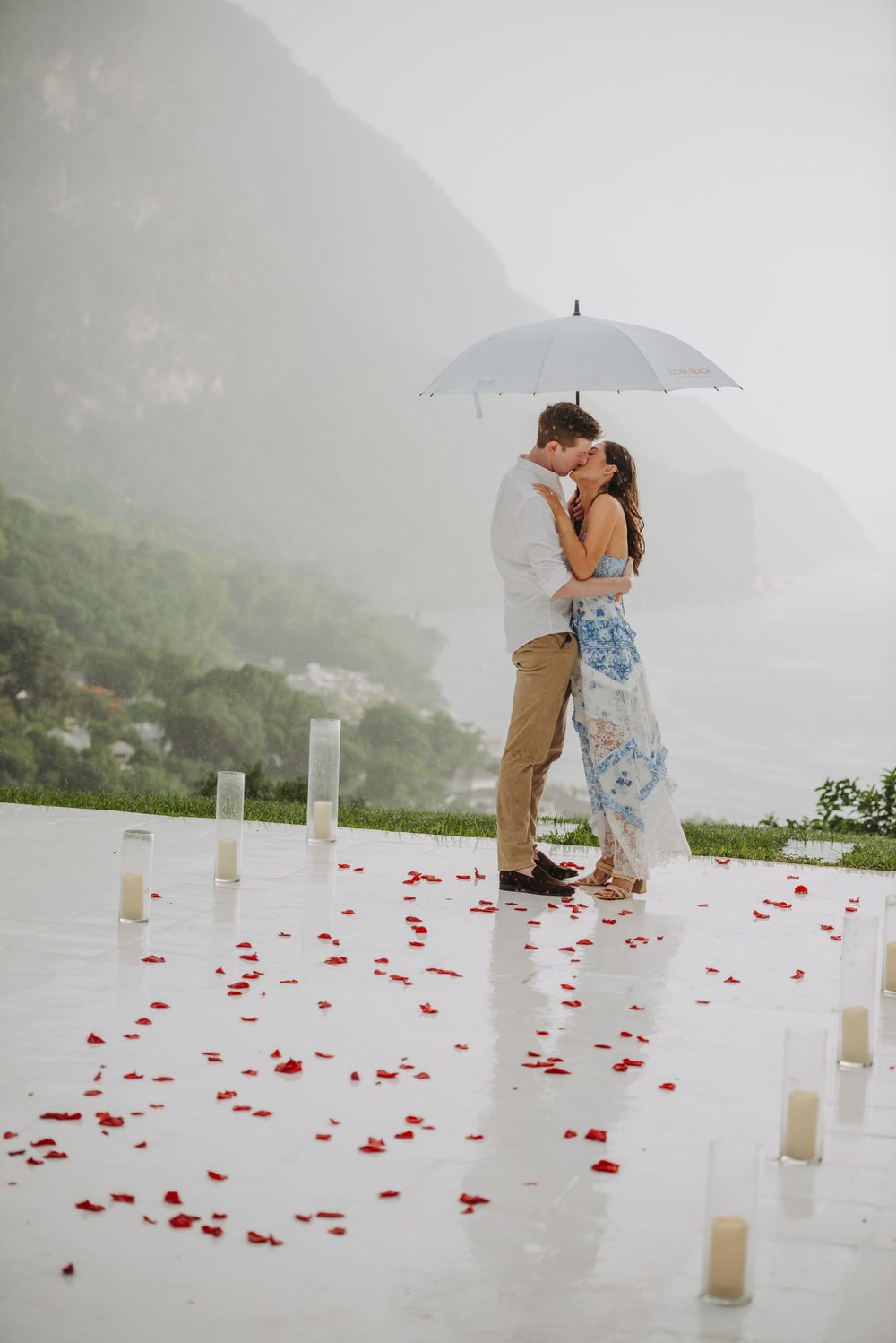 Saint Lucia Photographer captures Rainy surprise Proposal Photoshoot at Sugar Beach Viceroy in St Lucia