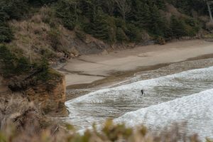 Muted beach landscape with gentle waves and soft sky – fine art photography print for serene home spaces.