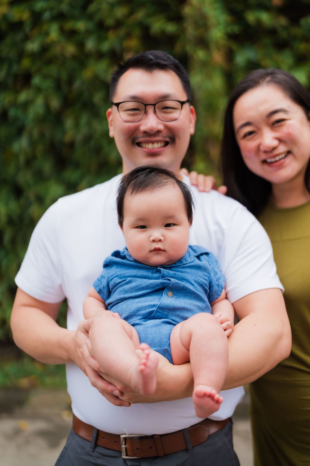 A small family with a newborn baby at Huashan 1914 Creative Park in Taipei City.