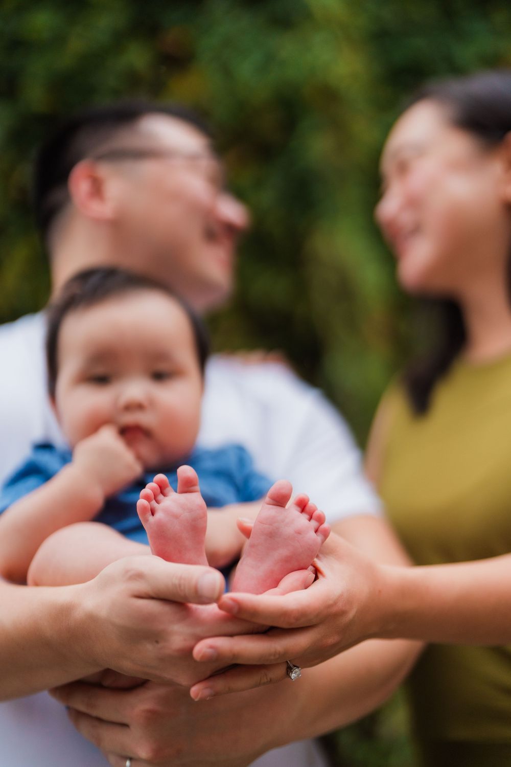 A small family with a newborn baby at Huashan 1914 Creative Park in Taipei City.
