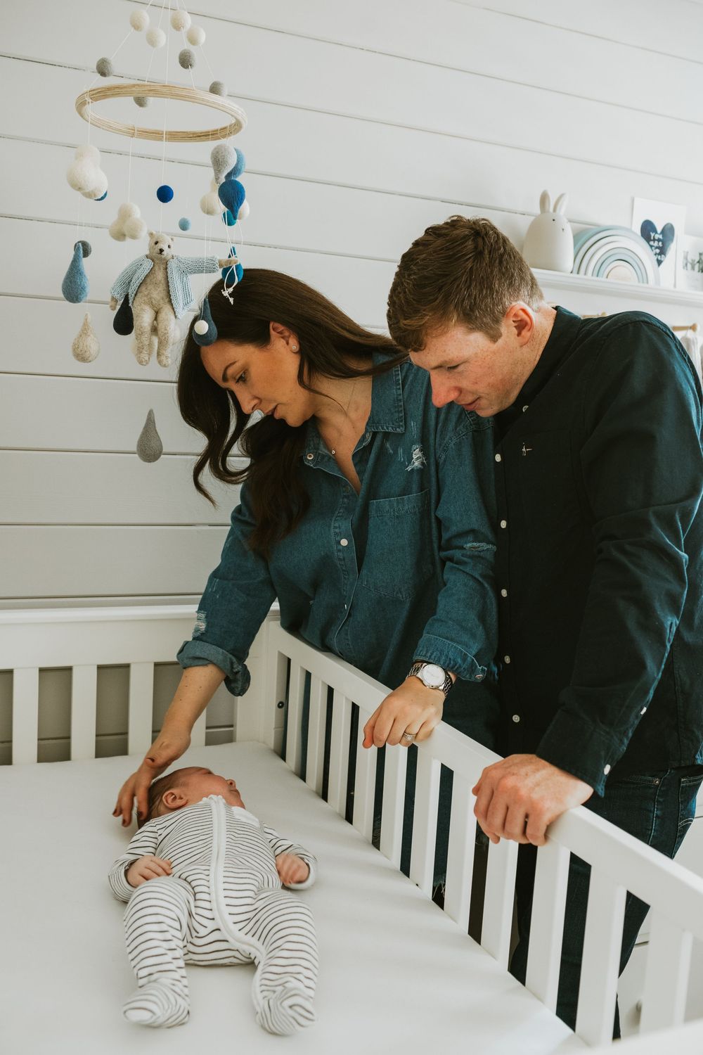 Dorset In-Home Newborn session mum and dad in nursery