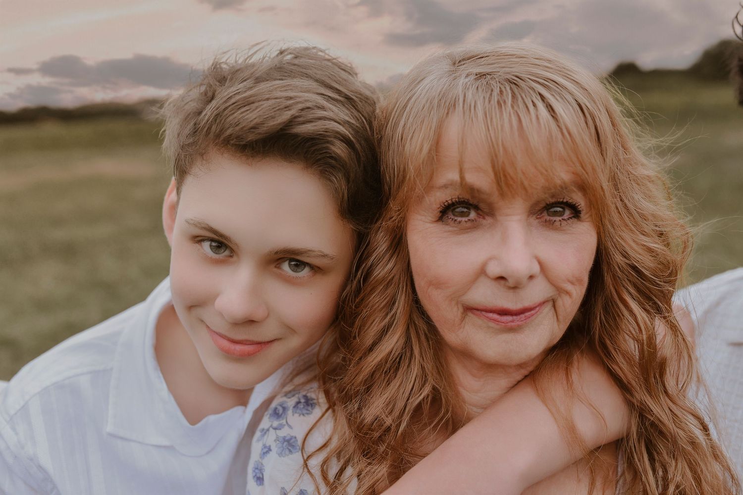 Candid moment between grandmother and grandchildren during family photos