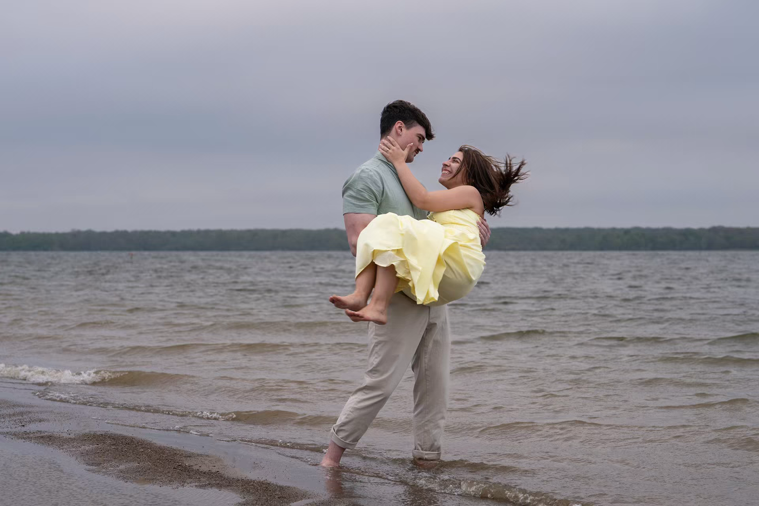 playful Alum Creek Beach Engagement Photo