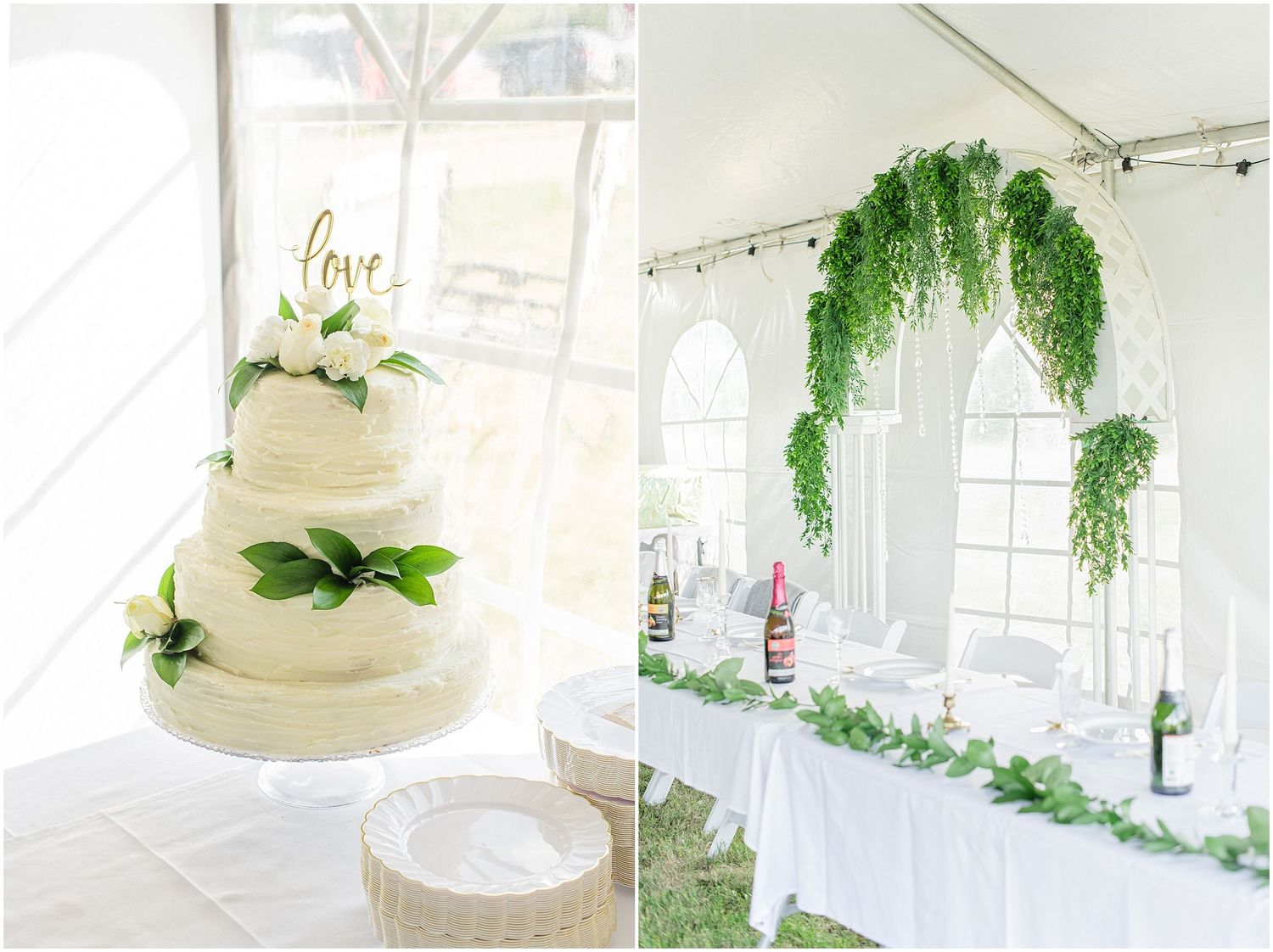 Elegant three-tier white wedding cake with greenery and love topper beside a white floral reception table under a tent.