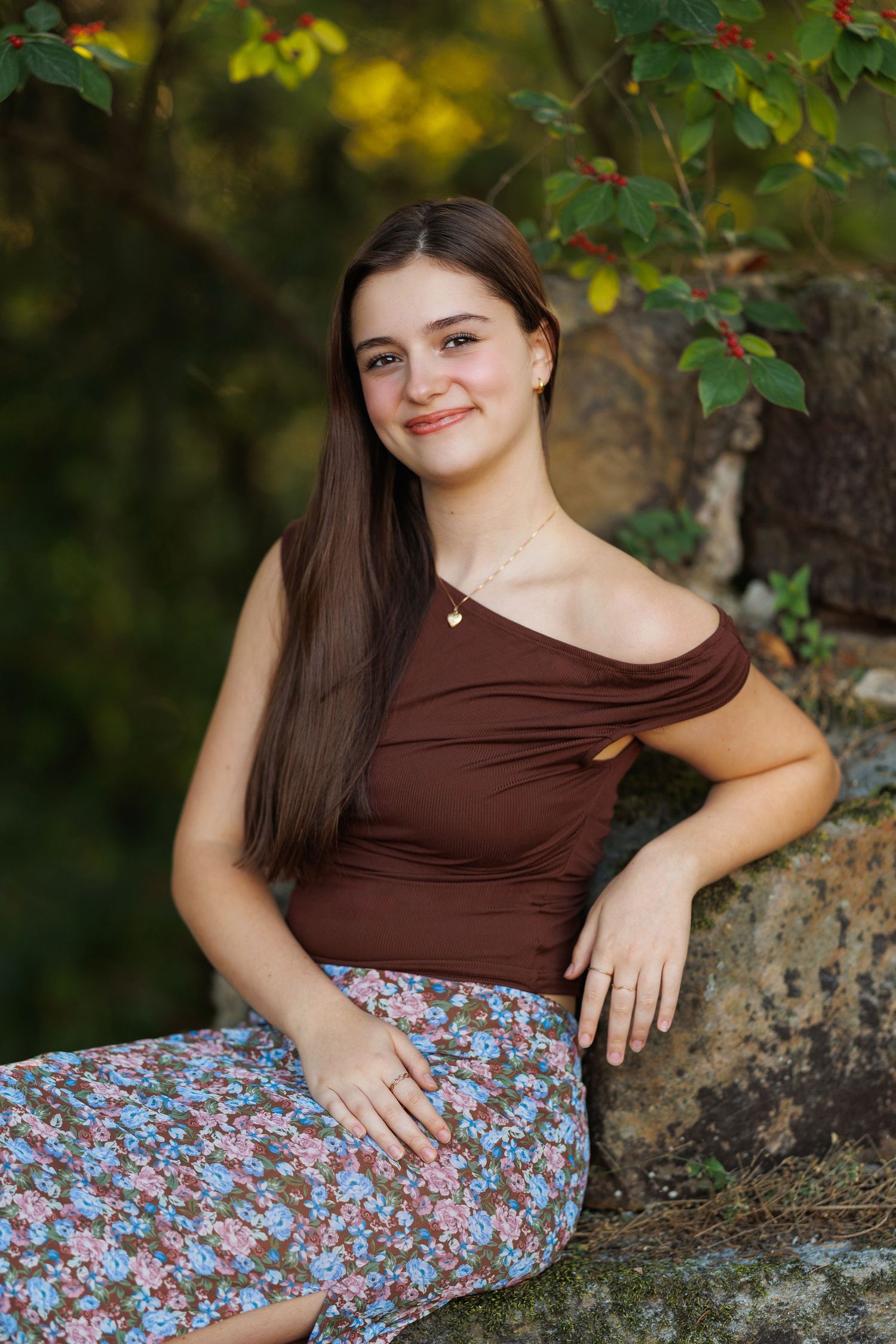 High school senior portrait captured by Tom Forrest Photography at the First and Main area in Hudson, Ohio.