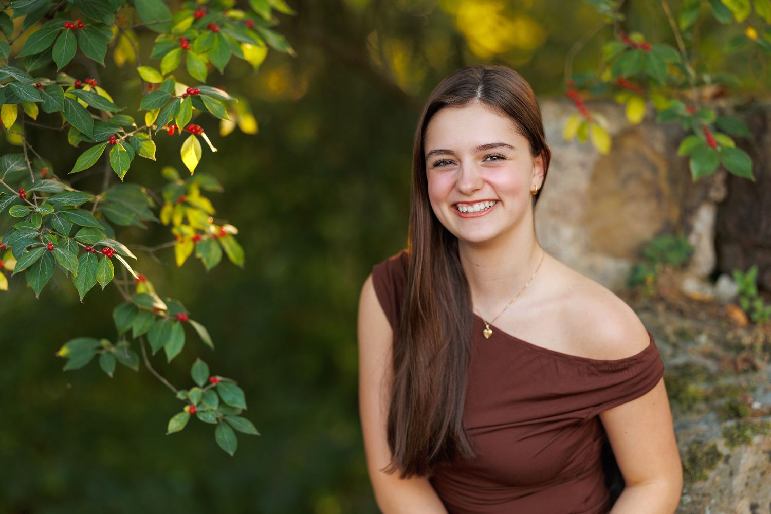 High school senior portrait captured by Tom Forrest Photography at the First and Main area in Hudson, Ohio.