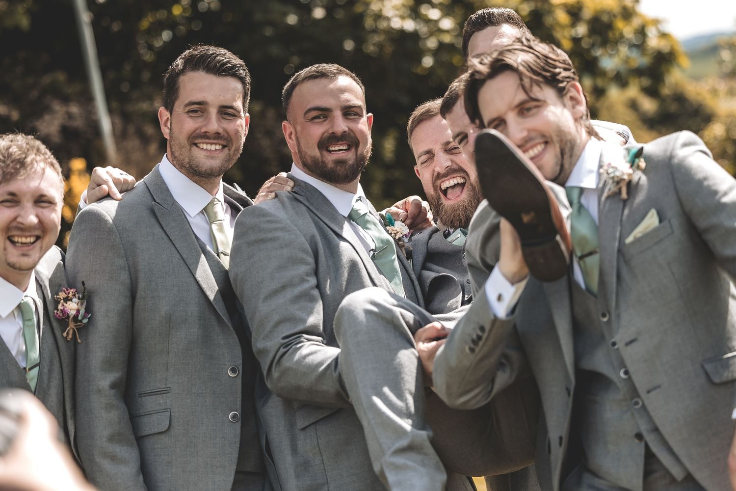 A fun, relaxed groom and groomsmen photo taken during a Yorkshire wedding day.