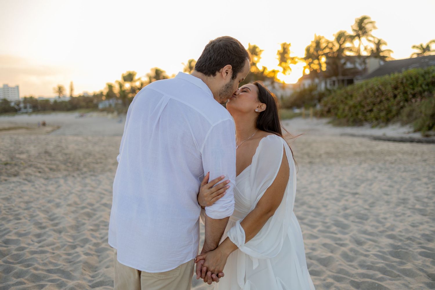 Warm, editorial couple session at the private entrance to Hillsboro Inlet beach.