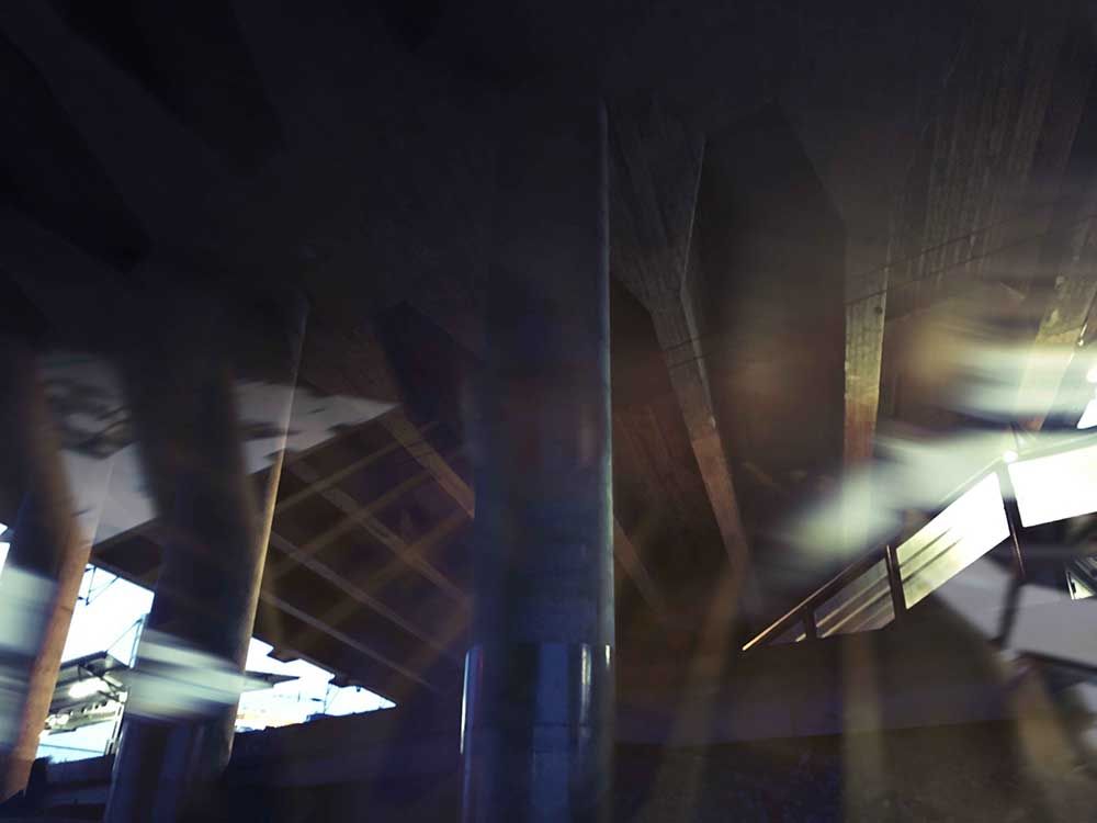 ICM photo of a bridge. Long pillars and stairs.