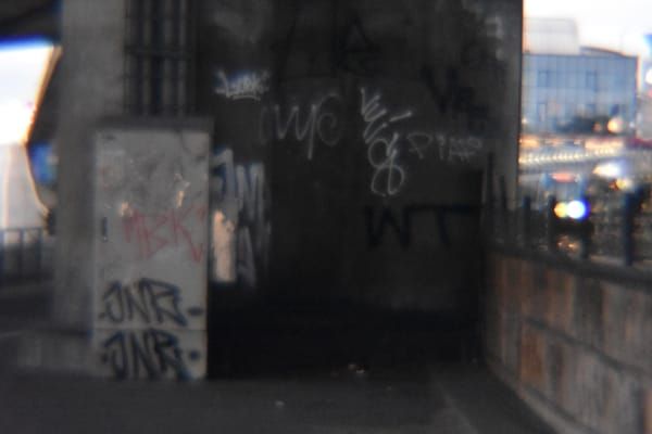Graffiti tags on some walls.