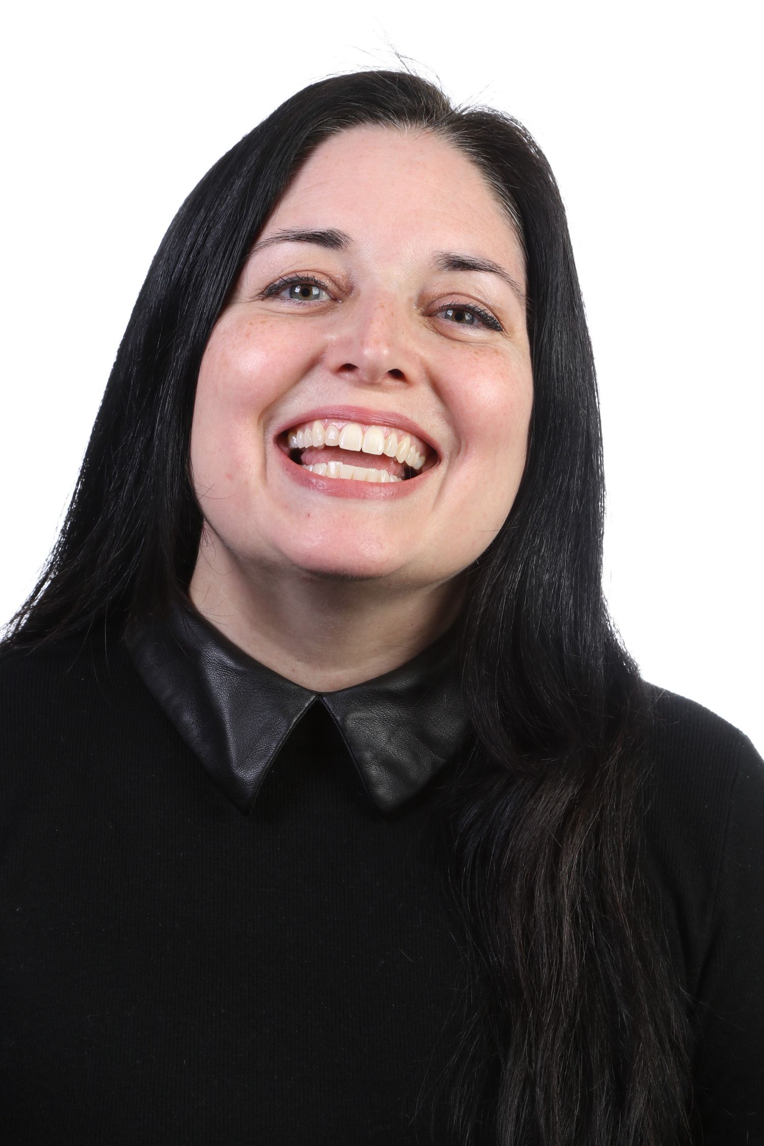Portrait of me mouth open, introducing myself with a smile.