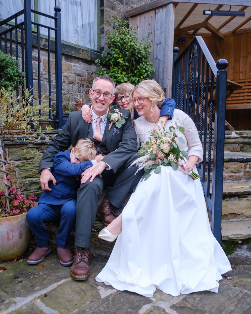 Bride and Groom with Bride's two sons at the Black Horse in Clifton