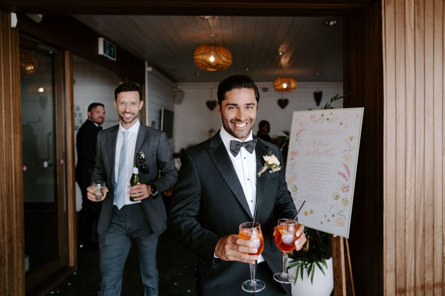 Wedding Guests enjoying drinks reception at Tunnels Beach Wedding Venue in North Devon