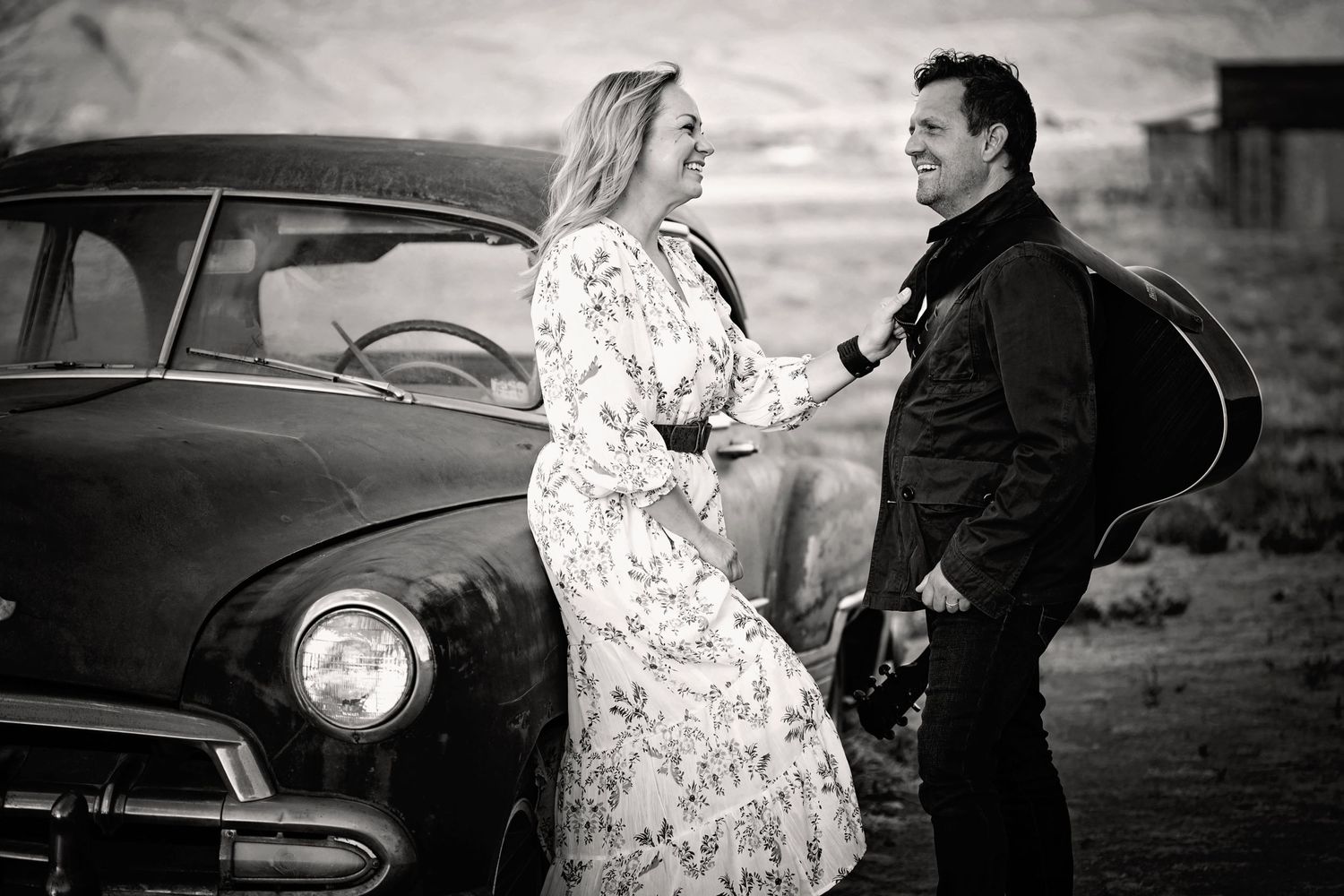 Rodge and Liz, music duo, in Elberta, Utah with a vintage car