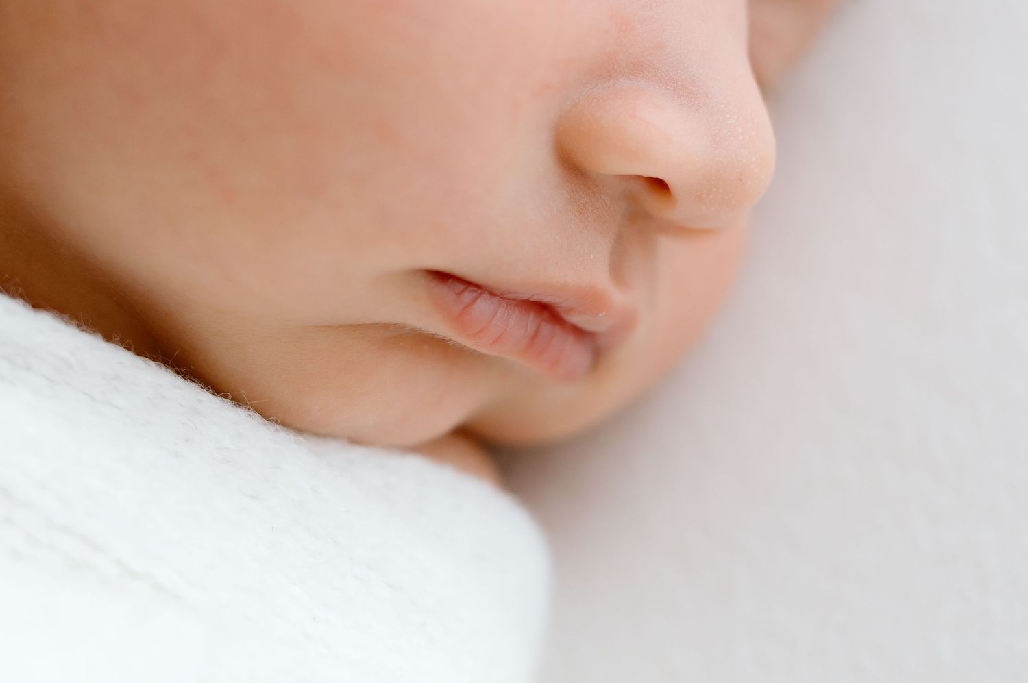 Newborn baby close-up captured in professional studio in Logan