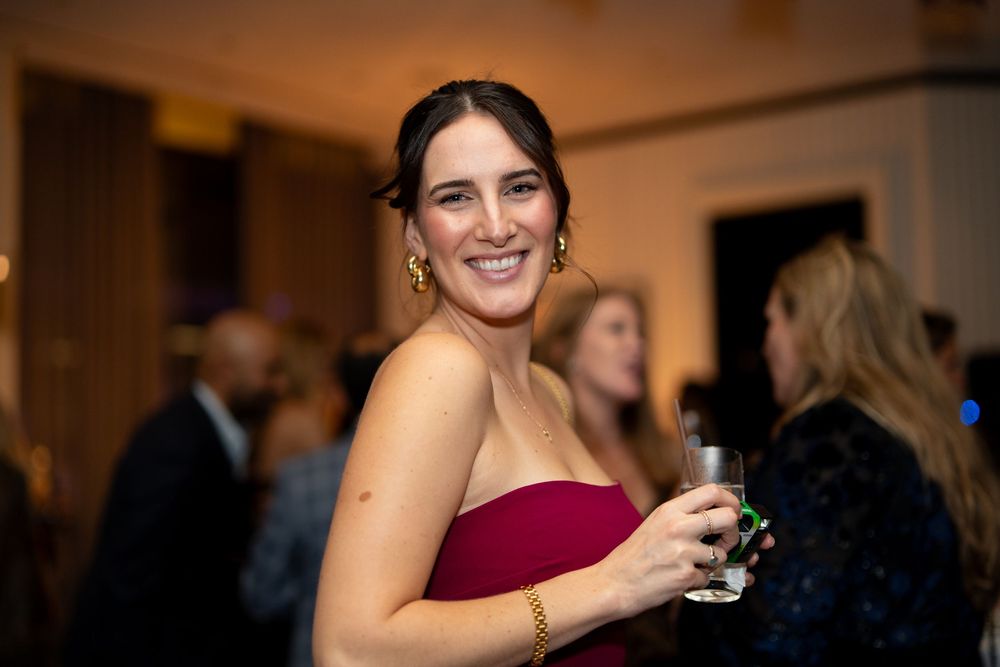 Guests celebrate at an elegant birthday party at the Boston Four Seasons Hotel photographed by Leah Ramuglia.