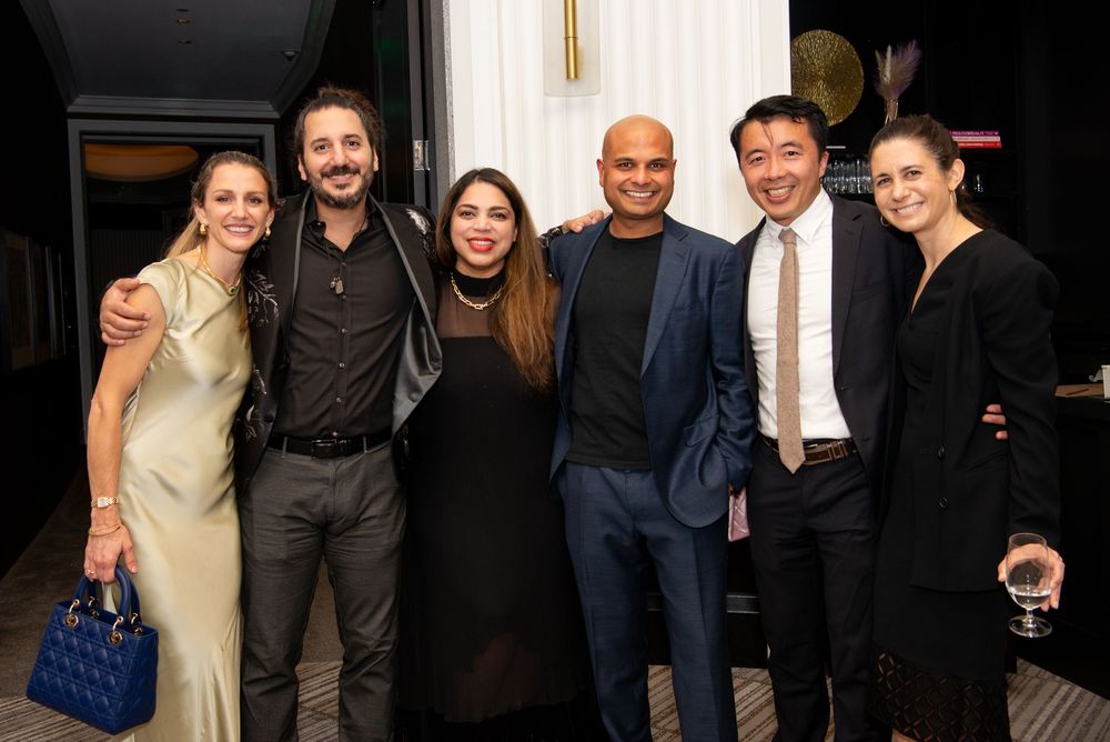 Group of guests at a 40th Birthday Party at One+One Restaurant at Boston’s Four Seasons Hotel with Leah Ramuglia Event Photography.