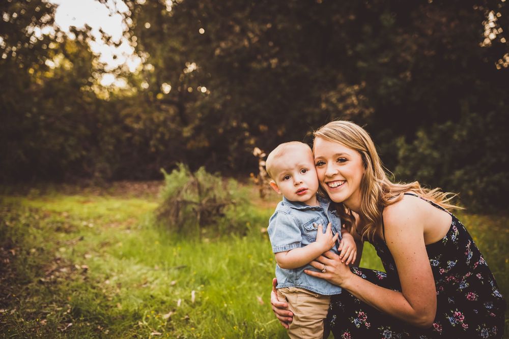 A series of outdoor family portraits taken in a lush green park setting during golden hour lighting.