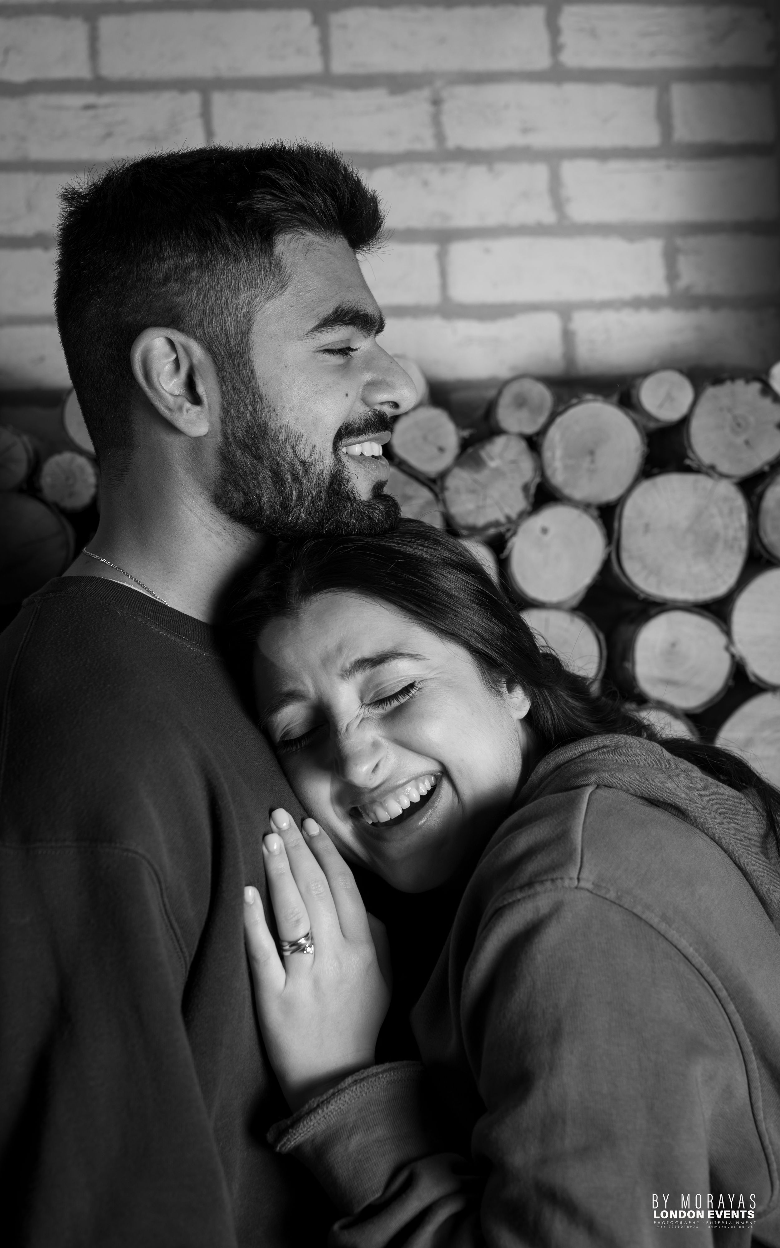 A romantic black and white photo sequence showing a couple embracing and laughing together.