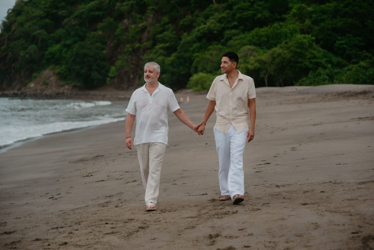 A romantic couple in white outfits share tender moments in a series of outdoor photos.