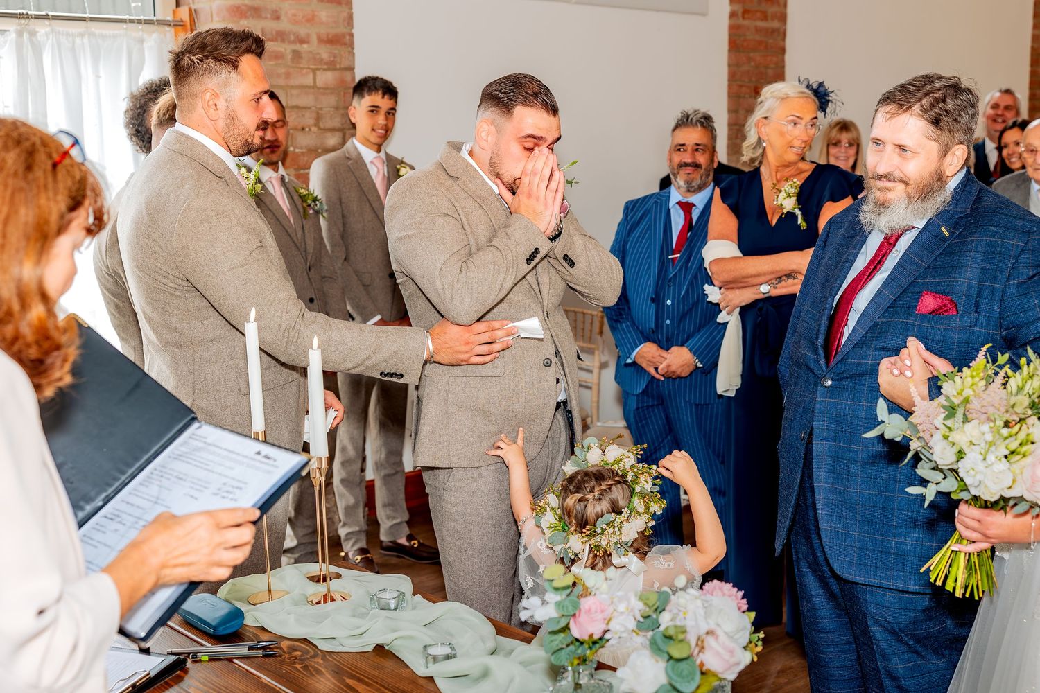 Documentary wedding photography capturing natural ceremony moment.