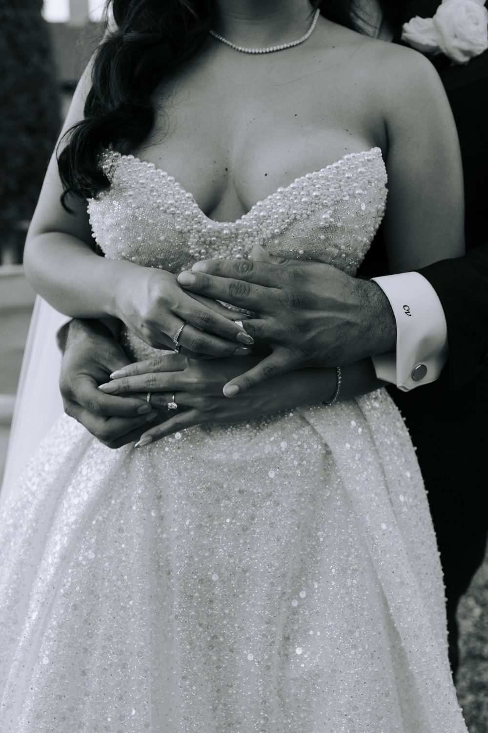 Close-up detail shots of sparkly beaded wedding dress bodice.