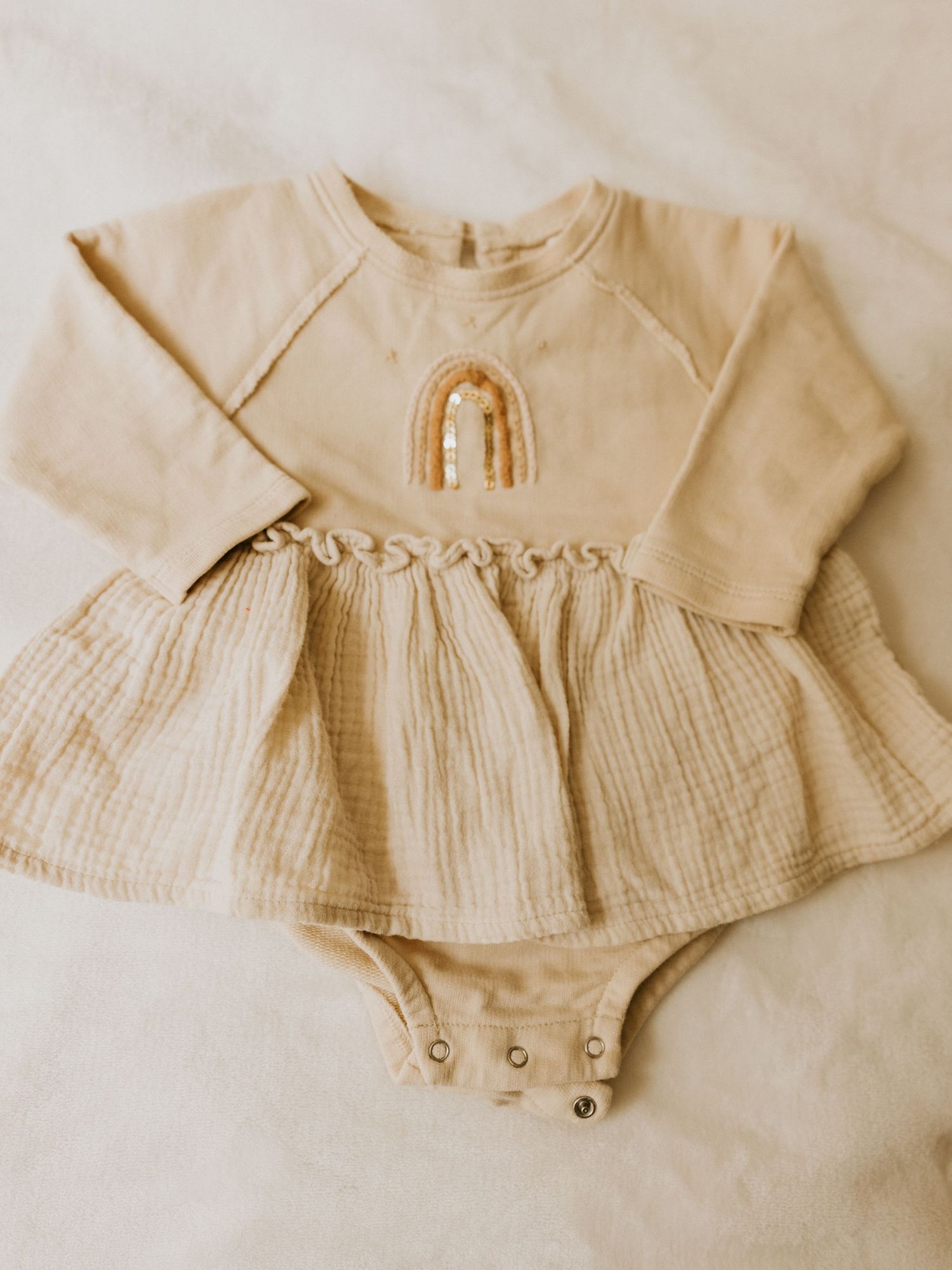 Adorable vintage-inspired baby boy outfit with white button-down shirt, blue striped suspender shorts and matching bowtie.