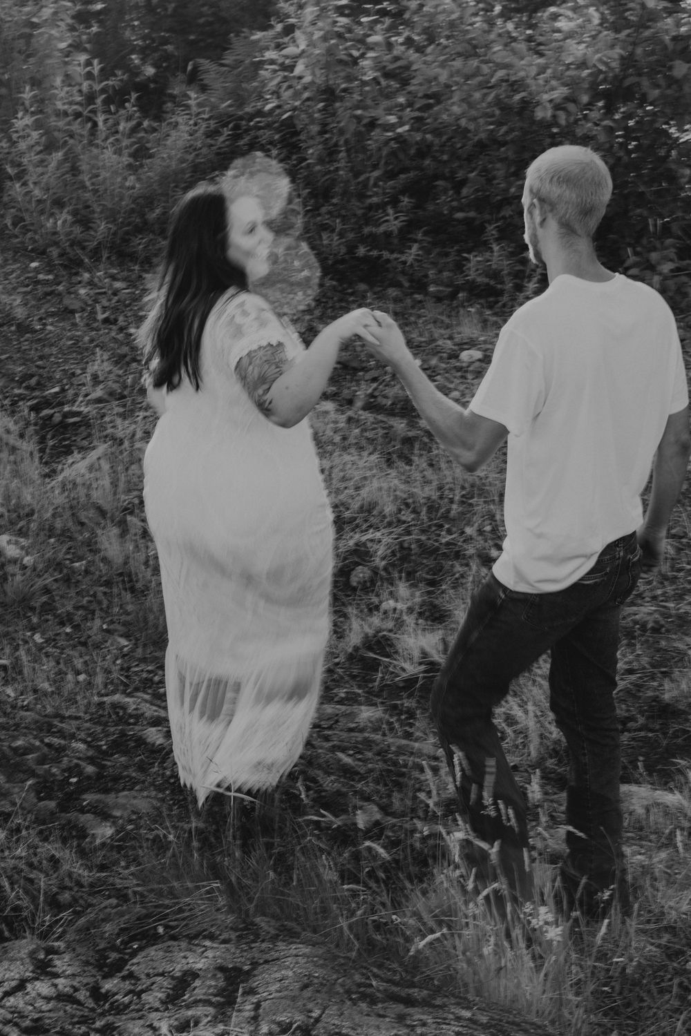 Couple holding hands at sunset | engagement photography