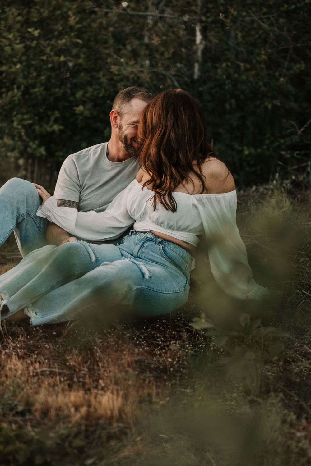 Couple holding hands at sunset | engagement photography
