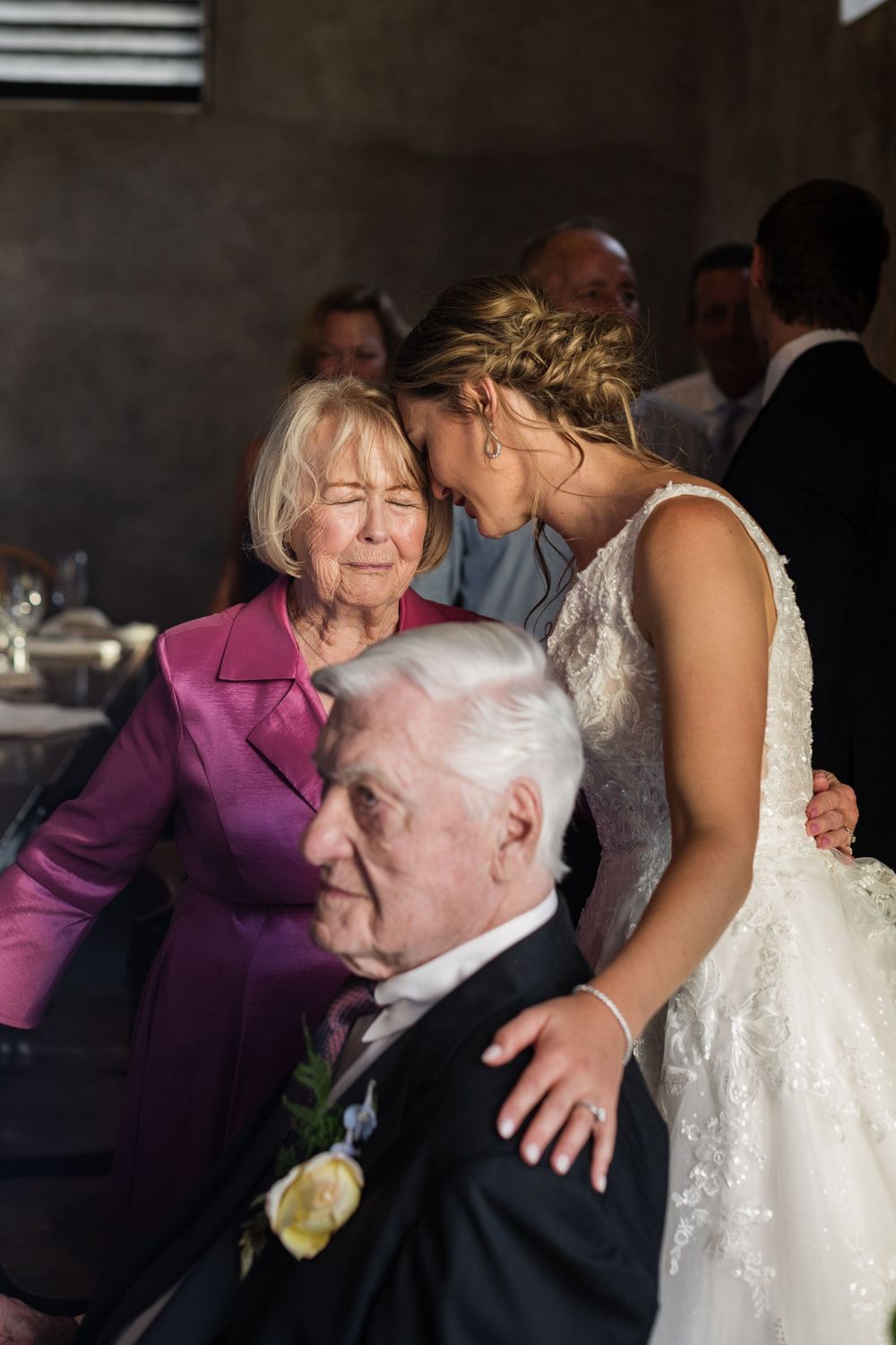 Emotional moment between bride and grandmother during reception celebration at Durham Hill Farm in Pipersville, PA.