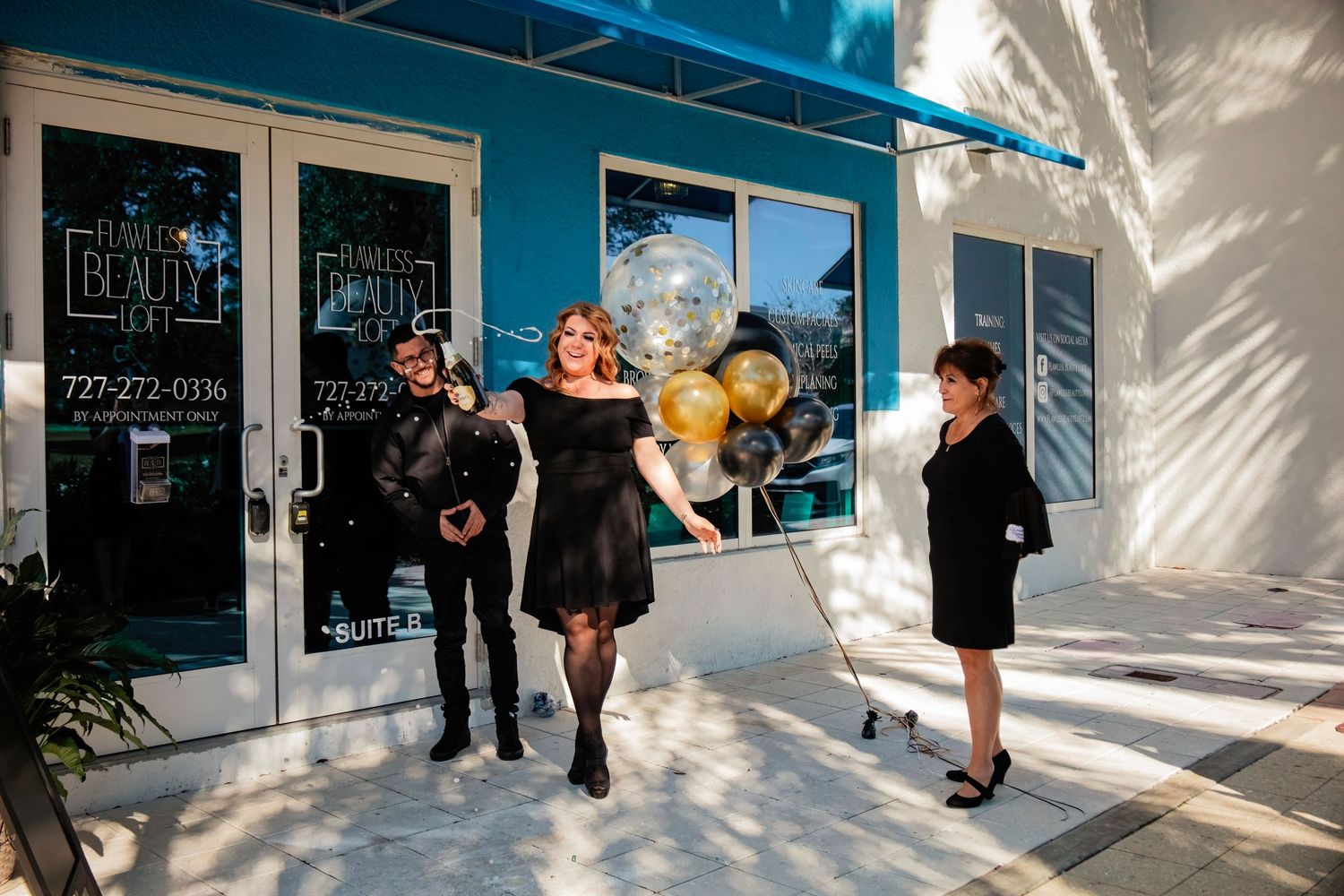 Business storefront entrance with guests arriving for a special event.