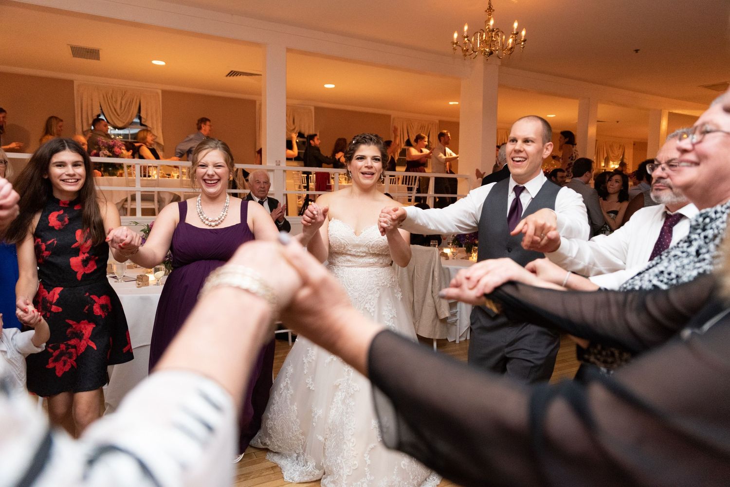 Bride & Groom & wedding guests dance the Hora at Nahant Country Club, with Leah Ramuglia Photography.