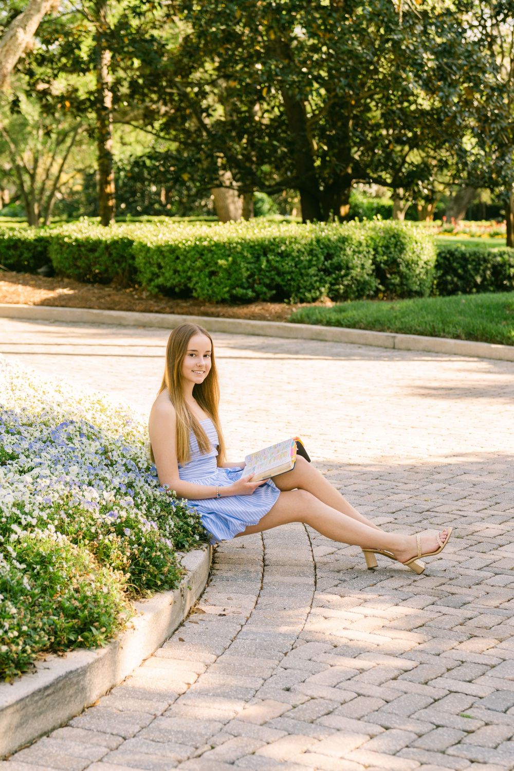 Sea Island Georgia senior session with Gabi posing among iconic Southern oak trees