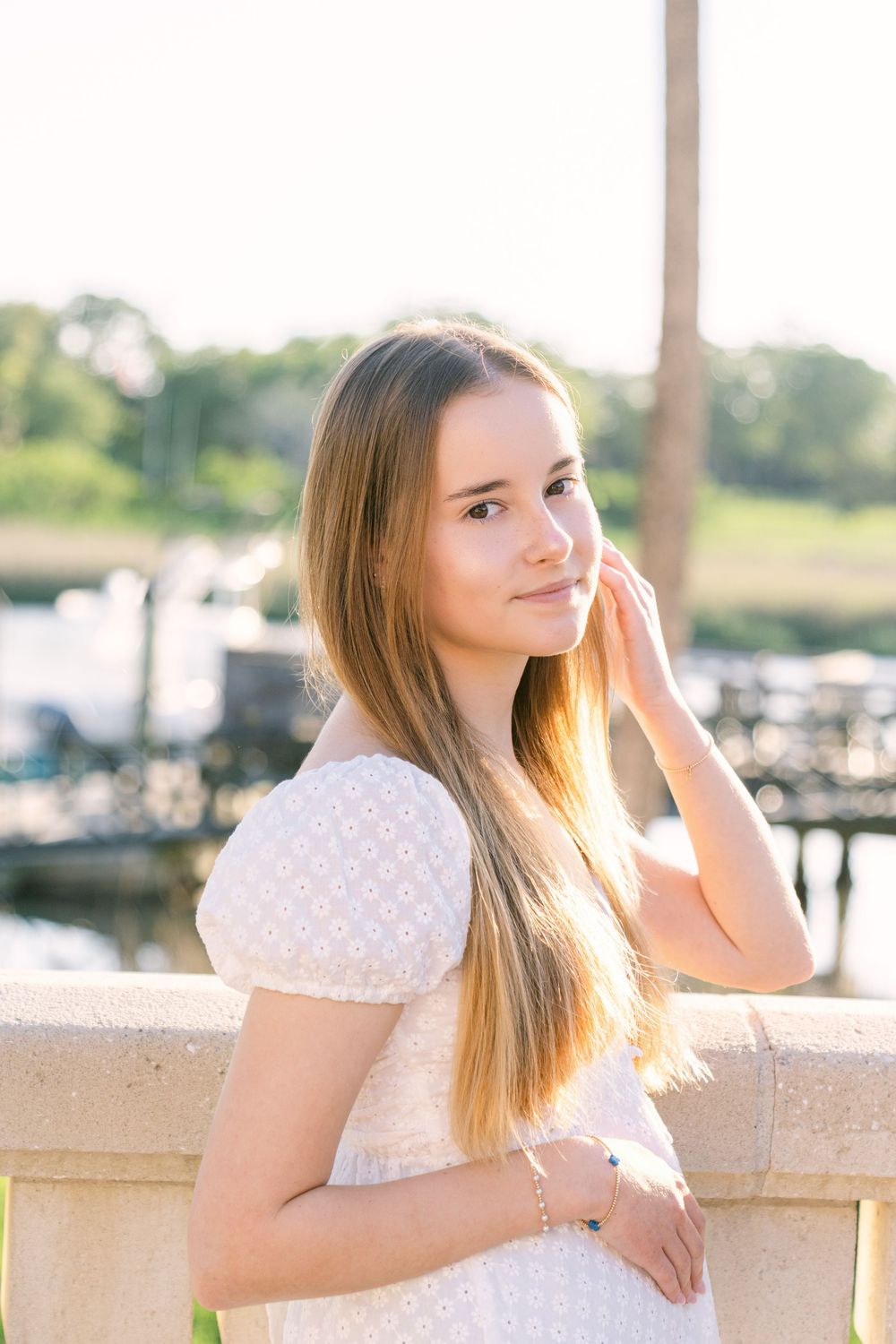 Personalized senior photo session featuring Gabi in one of Sea Island's scenic outdoor locations, portrait of Gabi at Sea Island Resort